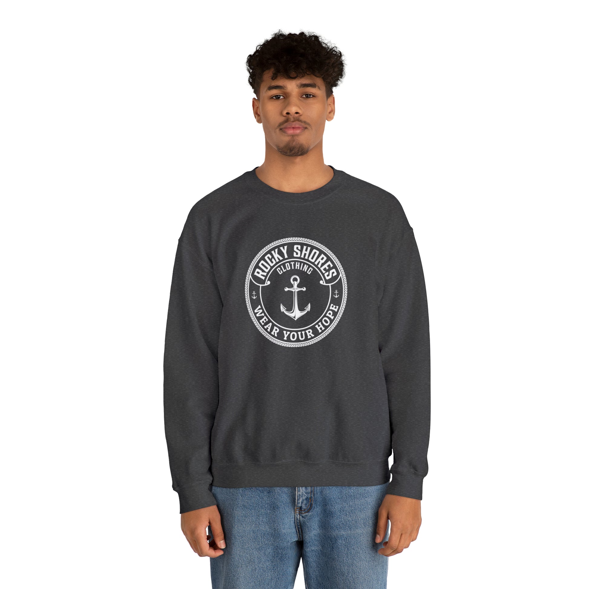 Introducing the "Rocky Shores Anchored In Hope Unisex Heavy Blend Crewneck Sweatshirt," where comfort meets versatility in a perfect blend.  Crafted with meticulous care, these sweatshirts are a blend of 50% cotton and 50% polyester, creating a harmonious balance between softness and durability.